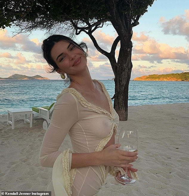 Kendall seemed to be in a jovial mood as she flashed a big smile while spending the evening on the beach