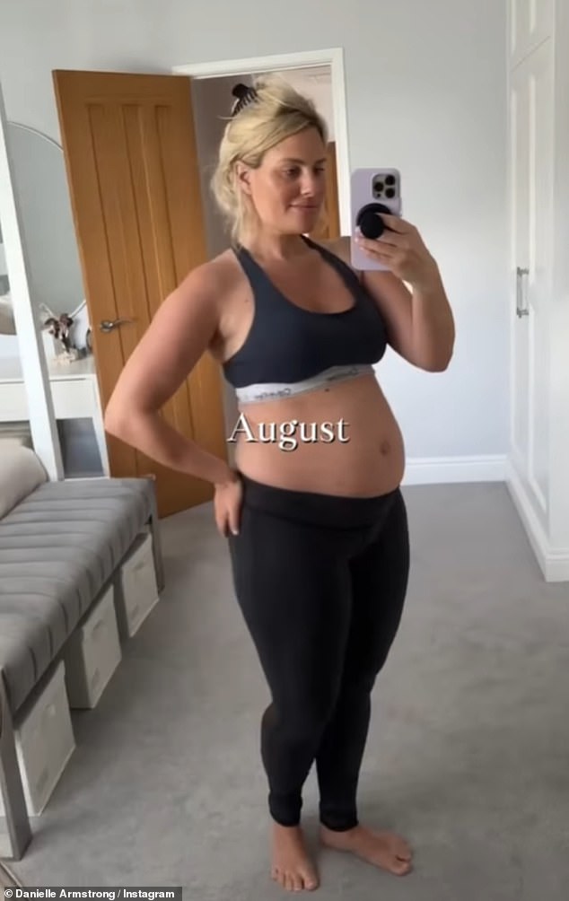 In her August photo, Danielle posed in a black sports bra and matching leggings