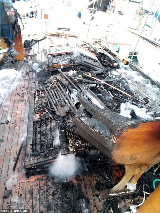 The ship's deck was destroyed.  Lawyers for the distraught couple warn that repairs must be completed quickly to prevent rain from washing the ash through the deck and into the cabin.