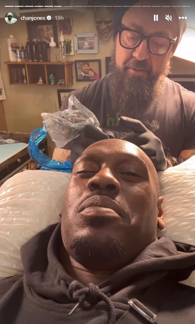 The 33-year-old took to Instagram to share a video of the tattoo artist lowering the needle onto his head