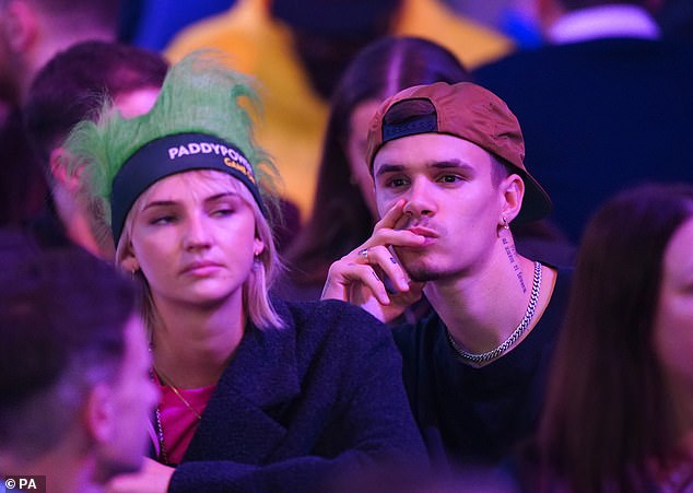 Beckham's son Romeo (right) was at Alexandra Palace for the final