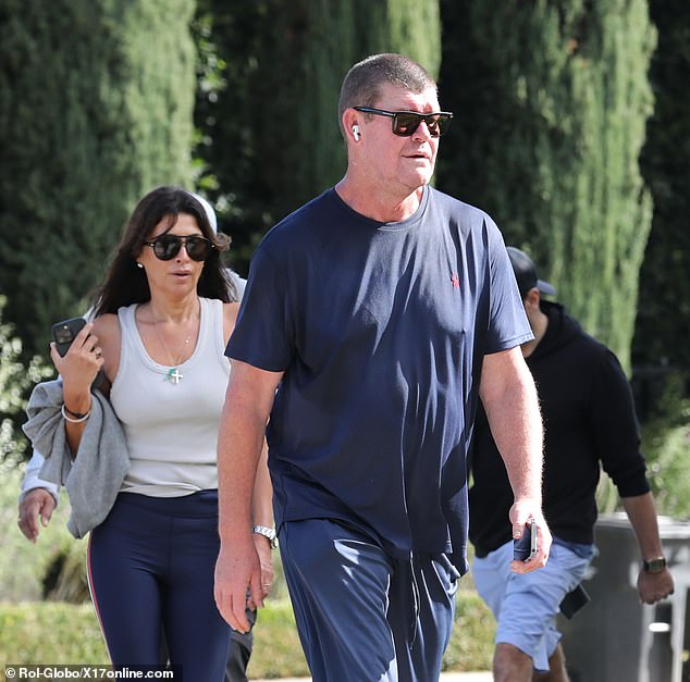 The billionaire casino mogul and former model were spotted strolling through Beverly Hills with some friends