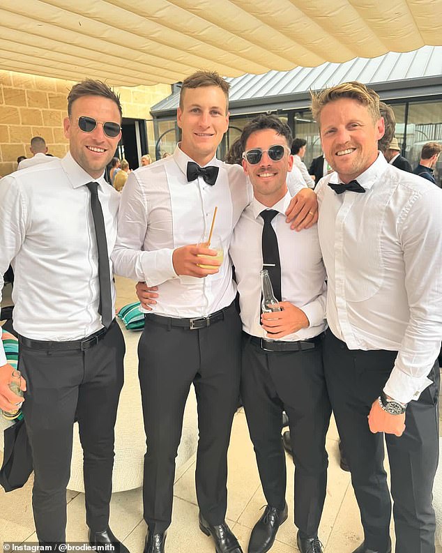 Footy stars including Brodie Smith (left) and Lachlan Murphy (second from right) and Rory Sloane (right) joined Dawson (second from left) for the biggest day of his life