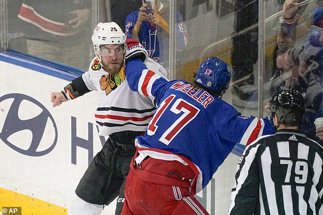 The final moment of excitement came when Chicago's Jarred Tinordi fought Blake Wheeler (17).