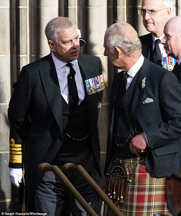 Prince Andrew and King Charles III speak after a vigil in memory of Queen Elizabeth II at St Giles Cathedral in Edinburgh in September 2022