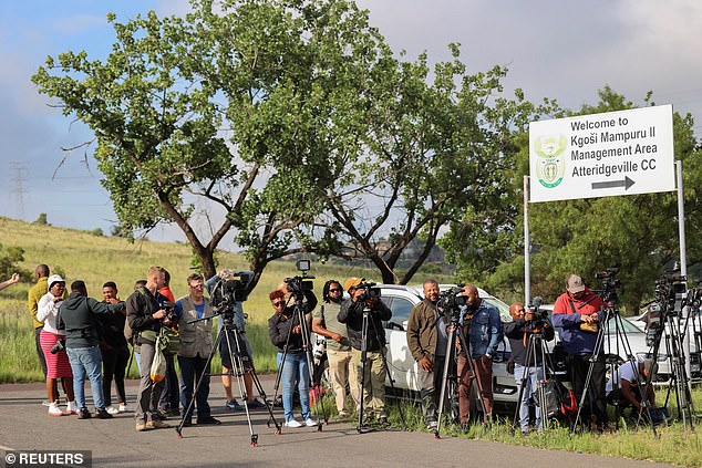 Members of the media set up outside the Atteridgeville Correctional Centre, where South African athlete Oscar Pistorius, convicted of the murder of his girlfriend Reeva Steenkamp in 2013, was released on parole