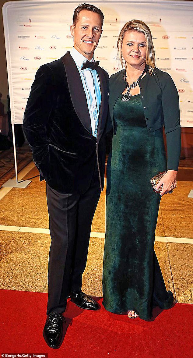 Schumacher's wife Corinna (pictured with him in 2012) has insisted on secrecy about his condition to family and friends