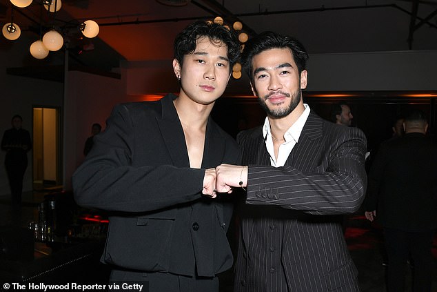 Song Li and Justin Chien fist bumped at the bash