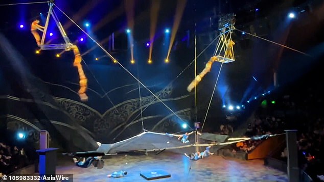 All five acrobats are sent to the corners of the trampoline, with one even being violently thrown several meters to the hard floor (photo below)