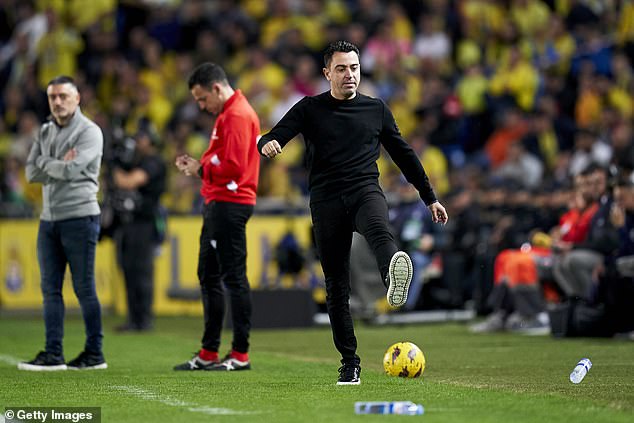 Barca boss Xavi - who also kicked a bottle during the match - is under enormous pressure at Camp Nou this season