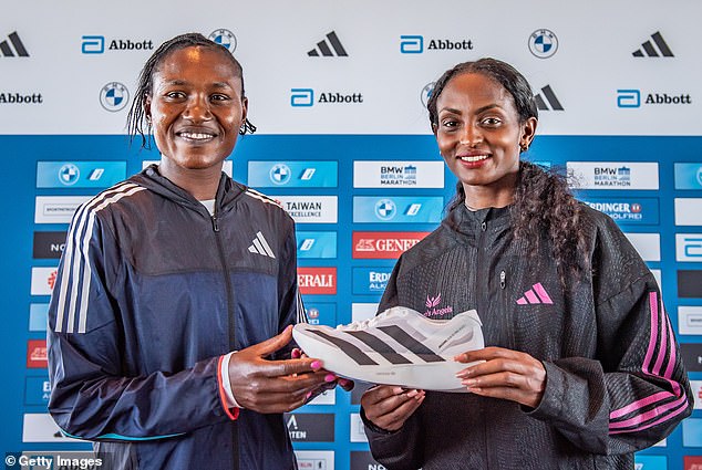 A similar shopping frenzy took place when Tigist Assefa (right) set the women's marathon world record wearing Adidas' Adizero Adios Pro 1 shoes at the Berlin Marathon in September.