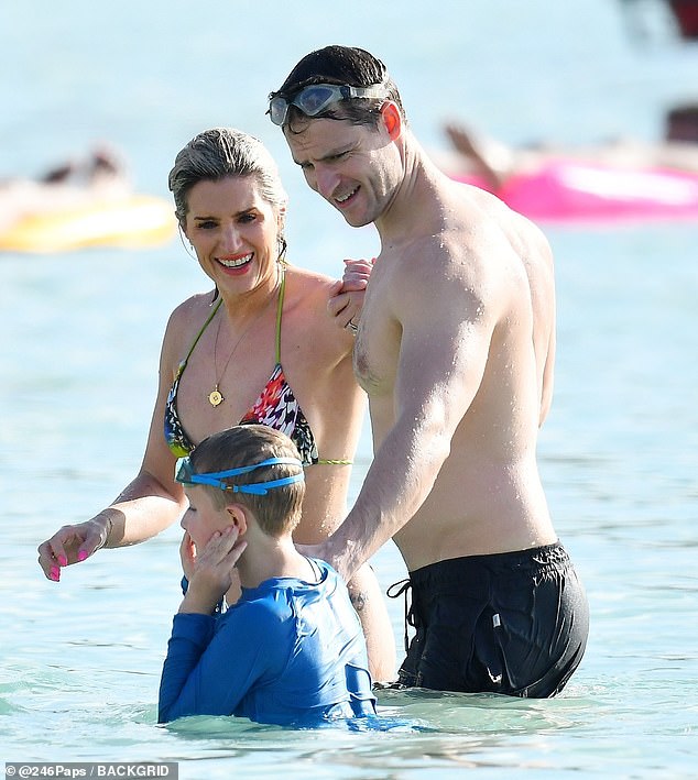 Sarah was joined on the beach by her husband Jonathan Smith and their seven-year-old son Stanley