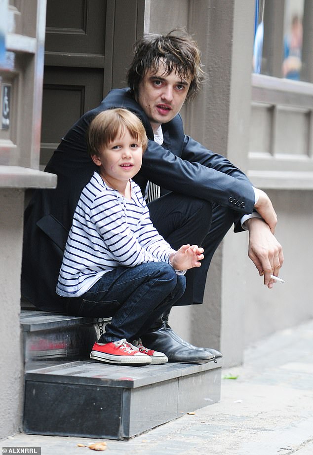 Pete is pictured with his son Astile in 2008.  The singer was once banned from seeing his son due to his drug addiction, but after going to rehab and getting clean, he became a much more hands-on father.