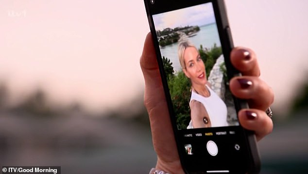 The former Big Brother winner was captured during the competition segment taking a stunning selfie in a white crop top