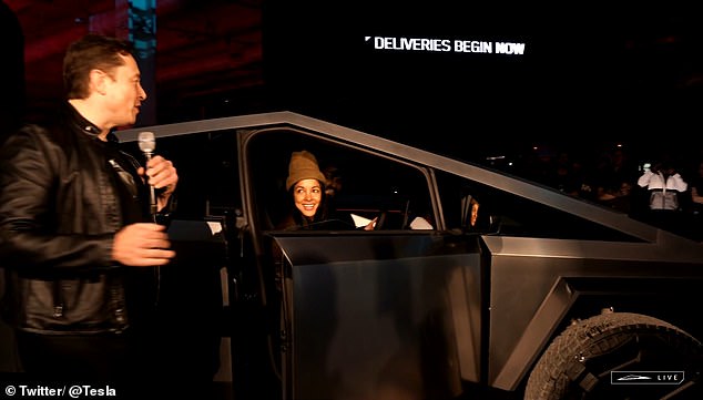 Elon Musk invited 10 people on stage to pick up their futuristic trucks, giving them indoor seating for the first time at the December delivery event