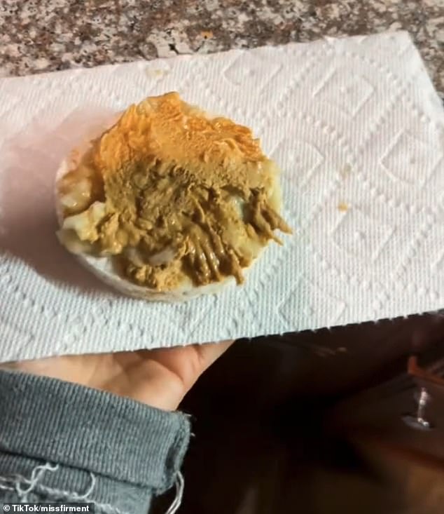 Another woman adds pureed banana and peanut butter to a plain rice cake to make her snack