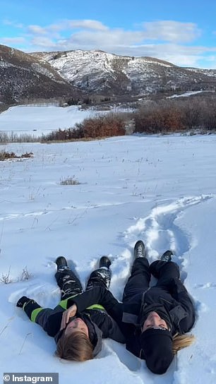 Ivanka captured her children lying in the snow and posing with the fish they caught