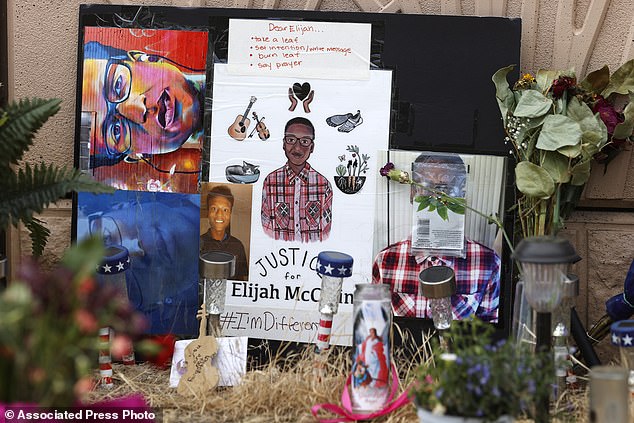 A makeshift memorial stands at a spot across the street from where Elijah McClain was stopped by Aurora, Colorado