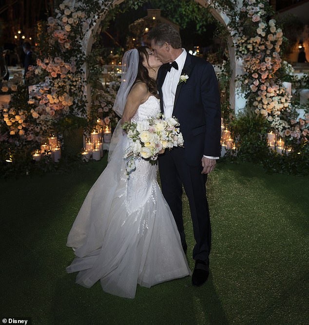 Gerry kissed his bride Theresa during the live wedding ceremony