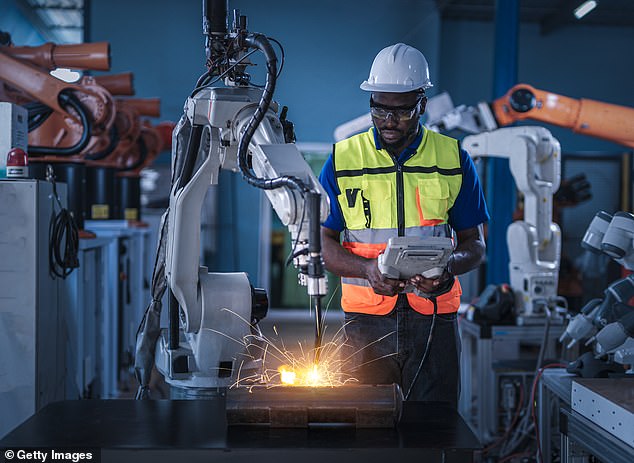 They said there was at least a 50 percent chance it would do the most within ten years, with more complex tasks such as installing electrical wiring in a house taking longer (stock image)