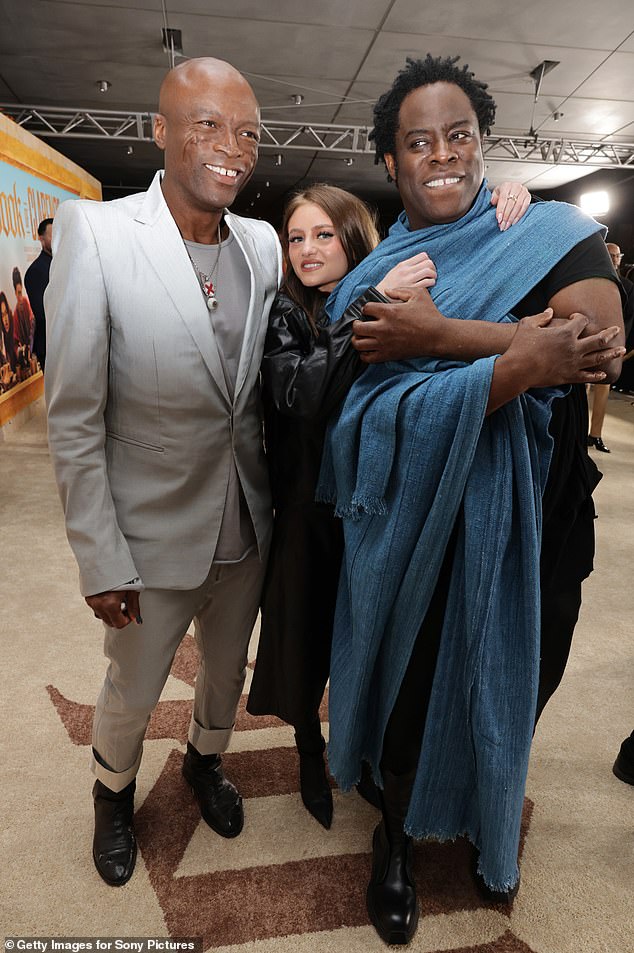 Seal looked dapper in an all-white suit;  seen with Leni and Jeymes on the red carpet