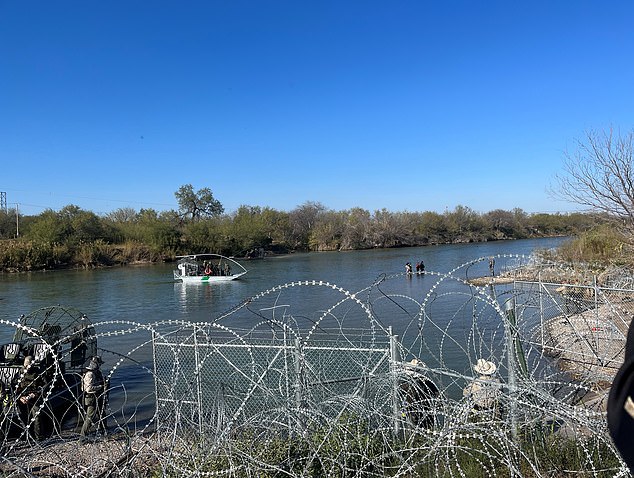 Migrants cross Rio Grande as Chairman Mike Johnson gives a briefing