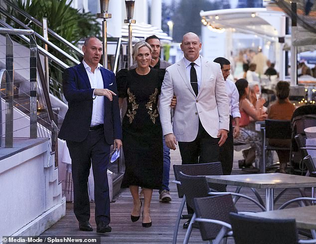 Zara and Mike Tindall are shown at a table at the Magic Millions Racing Women Achievement Awards