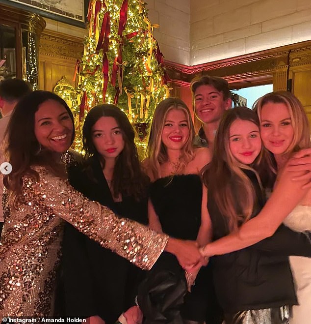 The Britain's Got Talent judge shared a fun gallery of Instagram photos documenting the night out, alongside her daughters Lexi, 17, Hollie, 11, and a group of their friends