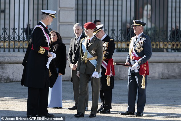 On Saturday she was the picture of military precision, with her hair combed back in a braided bun and not a crease in her dark gray uniform, with a blue sash.