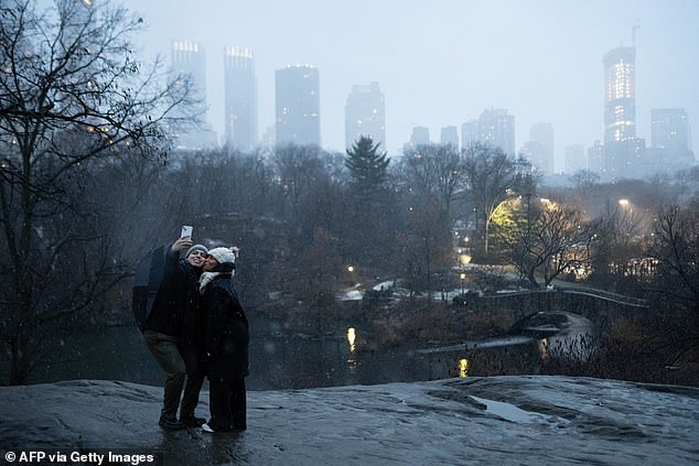 Saturday's snowstorm blanketed areas between eastern Missouri and the southern Great Lakes with up to four inches of snow, while parts of Indianapolis and St. Louis each saw four inches of snow (Photo: Manhattan in the snow on January 6)