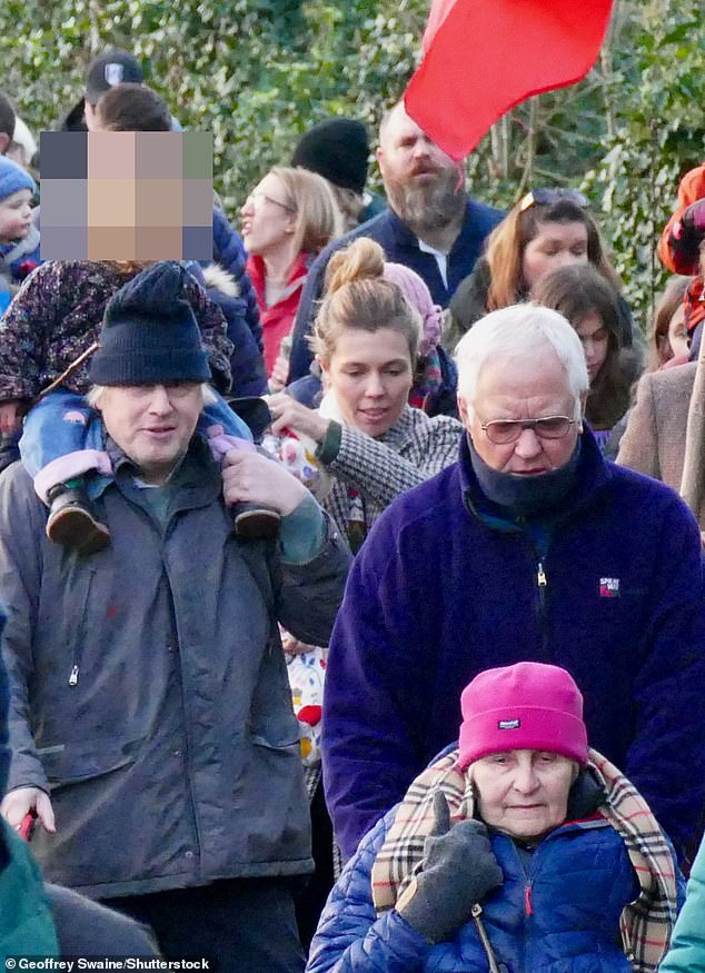 The couple joined locals as they marched along muddy footpaths to reach the ceremonial site