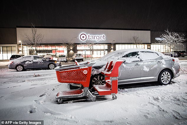 Target parking lot covered in snow in Closter, New Jersey on Saturday.  New Jersey reported 5.7 inches in parts of Bergen County, and saw smaller amounts of snow across the state