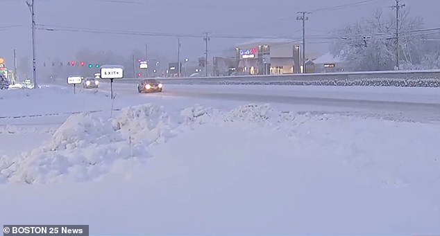 A snow-covered road in Westborough, Massachusetts on Sunday