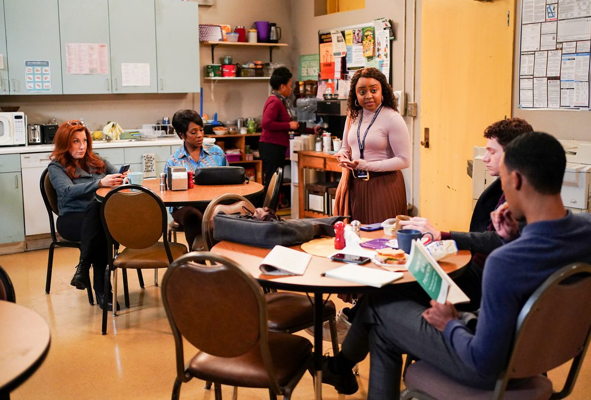 The cast of Abbott Elementary chats in the teacher's lounge.