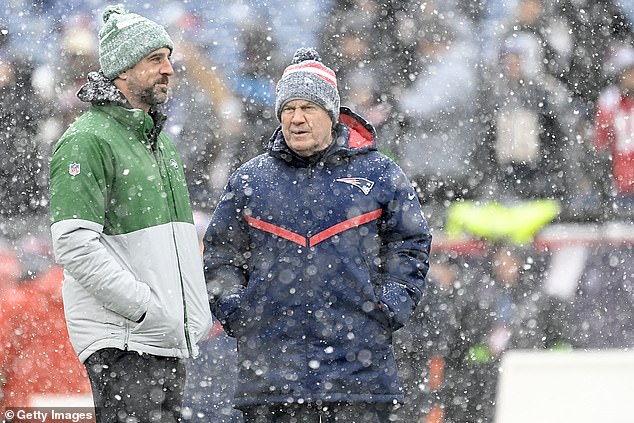 The Jets quarterback braved the cold on Sunday to support his teammates against the Patriots