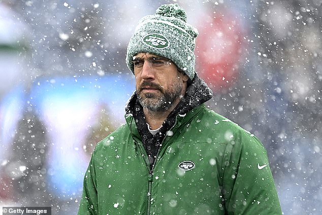 The 40-year-old holed up on Sunday to watch the Jets' season finale in frigid New England