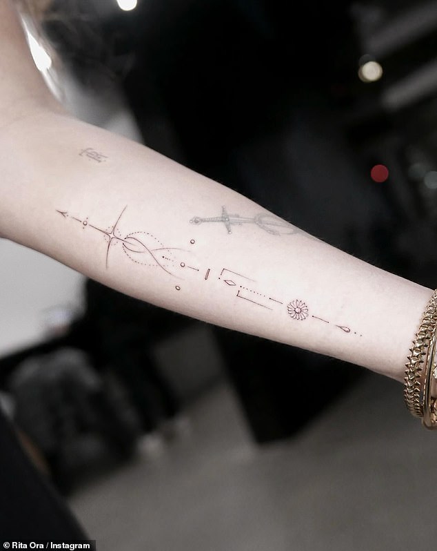 The hitmaker took to Instagram last week and shared photos of the moment she completed her extensive tattoo collection with an arrow designer on her forearm