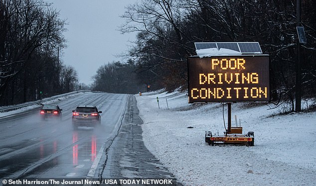 Drivers on the Sprain Brook Parkway in Yonkers, New York Sunday.  Forecasters predict poor driving conditions on the roads due to the storm