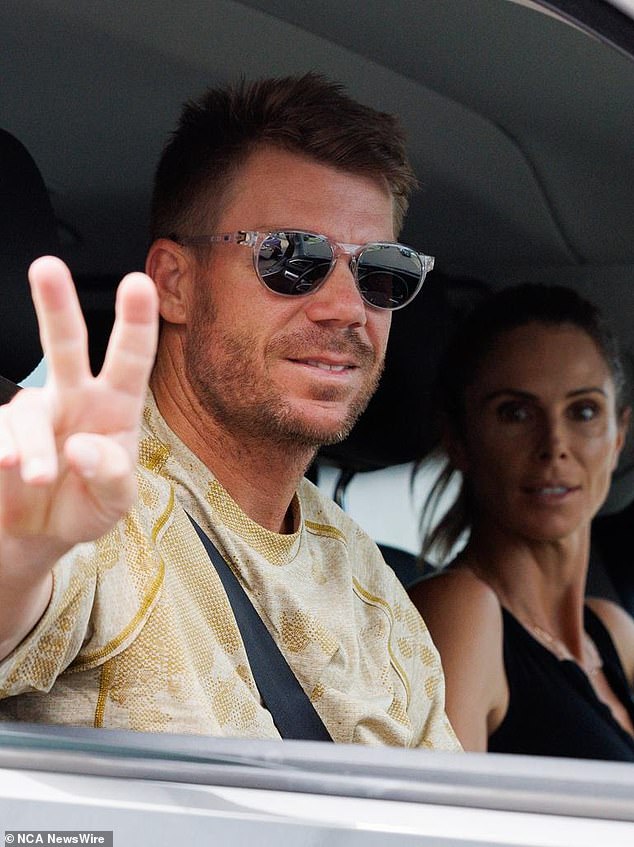 Warner was joined by wife Candice (pictured together) after partying with one of Australia's biggest music stars to celebrate his retirement