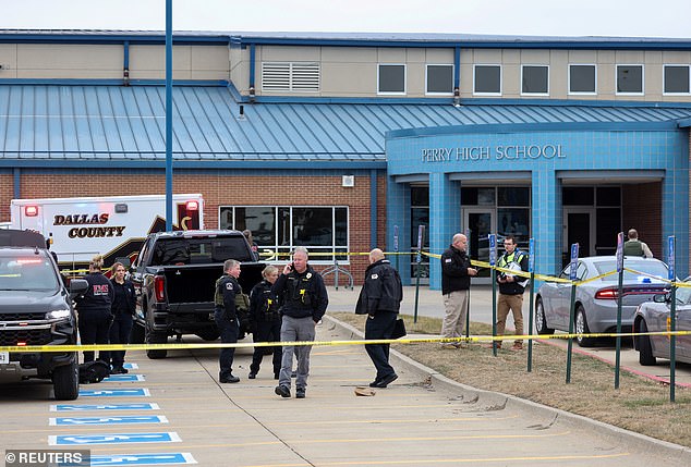 Law enforcement officer at the scene of the Perry High School shooting last week