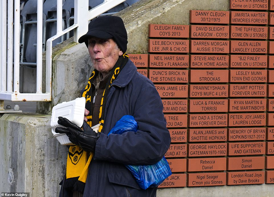 Supporters took advantage of the food kiosks dotted around the ground before heading to their seats ahead of the match