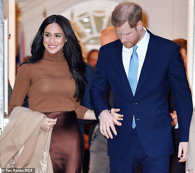 Prince Harry looks down as they emerge from Canada House.  The next day they would announce their intention to step back from their royal duties and spend more time in North America