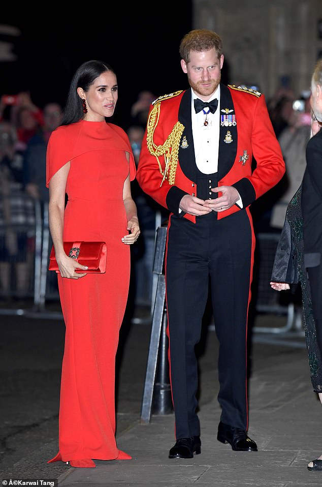 Smartly dressed Meghan and Harry attend the Mountbatten Festival of Music at the Royal Albert Hall.  This was during their last week as working royals