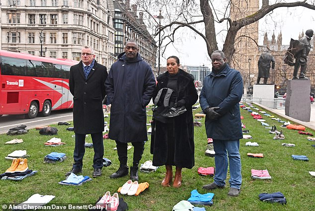 CEO of The Ben Kinsella Trust Patrick Green, Idris Elba, Yemi Hughes, mother of Andre Aderemi, and Bishop Mark Nicholson pose in Parliament Square today