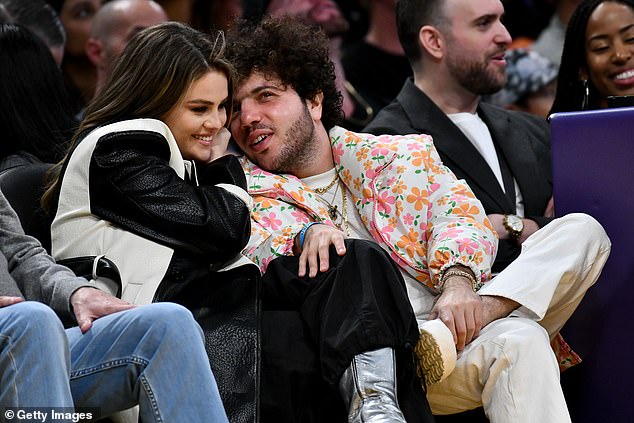 Smitten: Since going public with the record producer, the lovebirds have been sharing snaps together on social media and were recently spotted at a Lakers game earlier this month (photo on January 3)