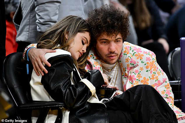 Cozy: At the Lakers vs Heat game in Los Angeles on Wednesday, the duo, who secretly dated for six months before announcing their relationship, didn't shy away from engaging in some PDA