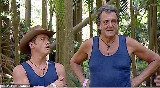 After moving from the BBC to ITV, David took part in the Australian series I'm A Celeb in 2005, with the likes of former EastEnders actor Sid Owen as his campmate (pictured in 2005)