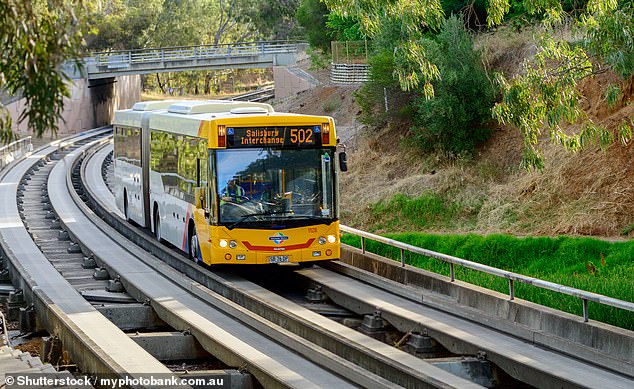 Buses from 18 different routes wind through the northeastern suburbs before joining the guideway at one of two access stations.  Steering is completely controlled by the guideway and buses reach speeds of up to 100 km per hour (stock image)