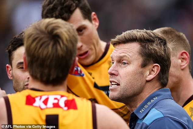 Hawthorn said the coach will make a phased return to his duties when he returns to Australia