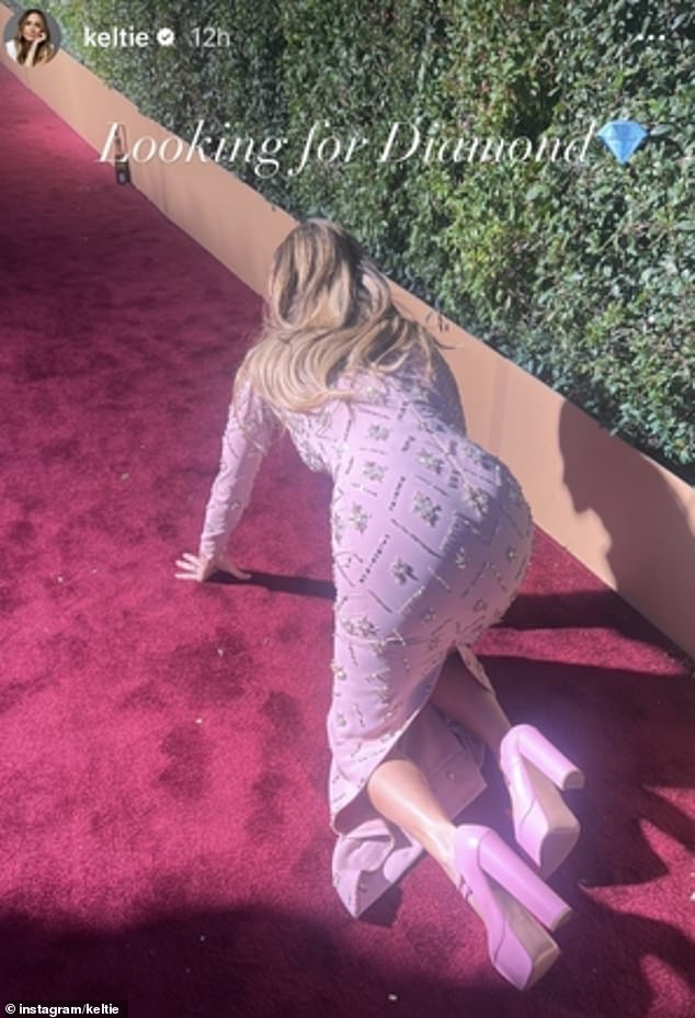 The star shared a photo of herself crawling down the red carpet on her hands and knees as she hunted for the four-carat diamond